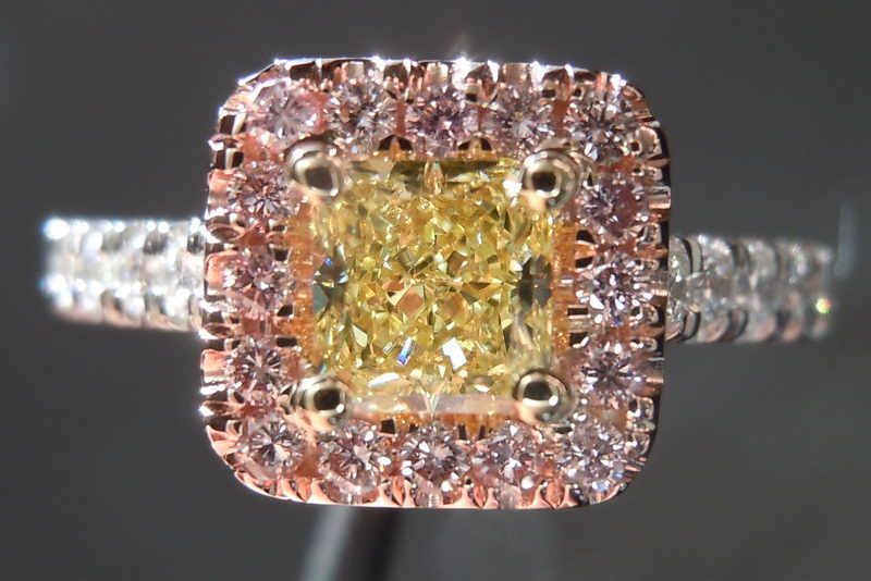 halo diamond ring with pink and yellow diamonds