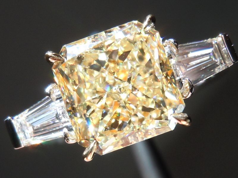 yellow diamond ring with bullets