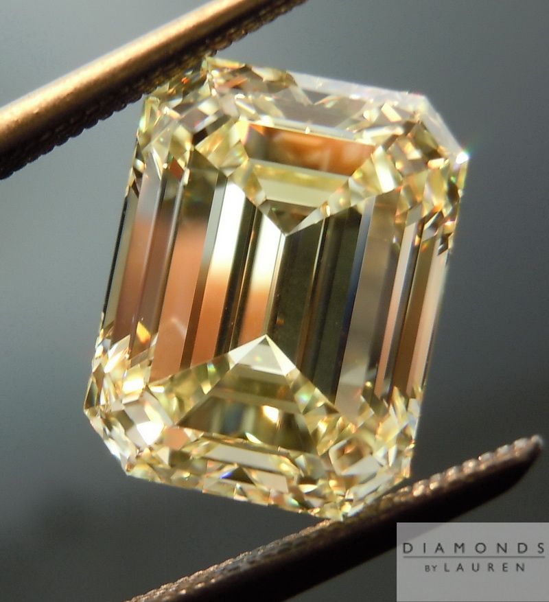 fancy light yellow emerald cut diamond ring