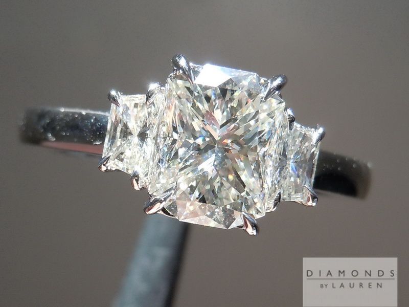 radiant cut three stone diamond ring