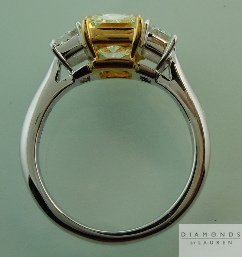 yellow diamond three stone ring