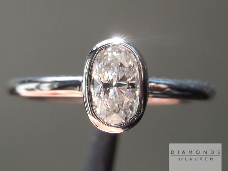 colorless oval shape diamond ring