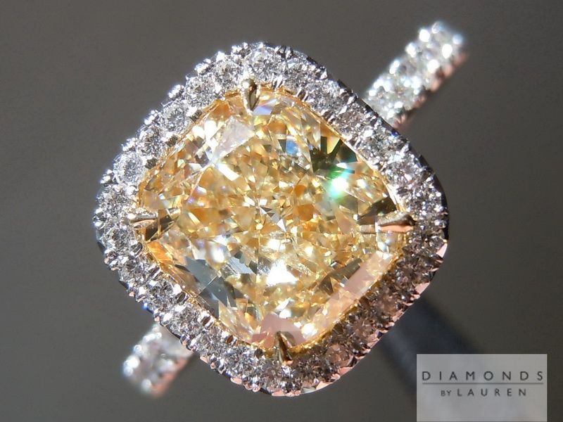 Cushion cut engagement rings in yellow gold