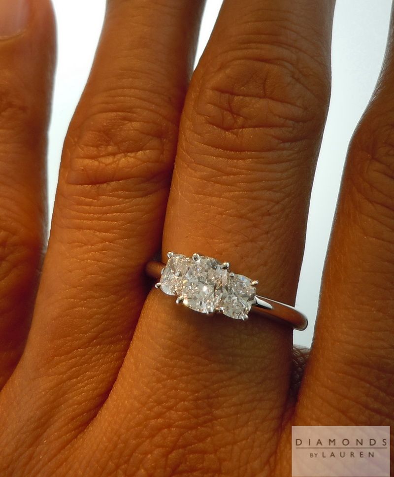 colorless three stone diamond ring