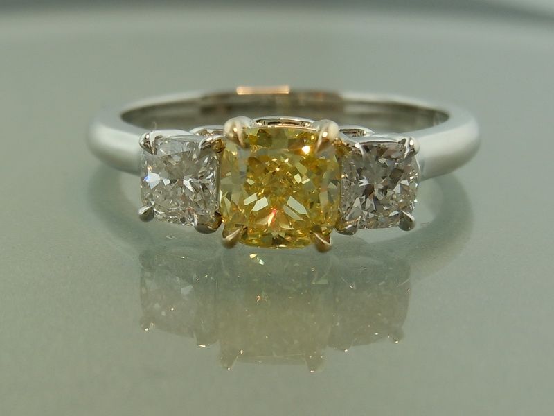 colorless and yellow diamond engagement ring