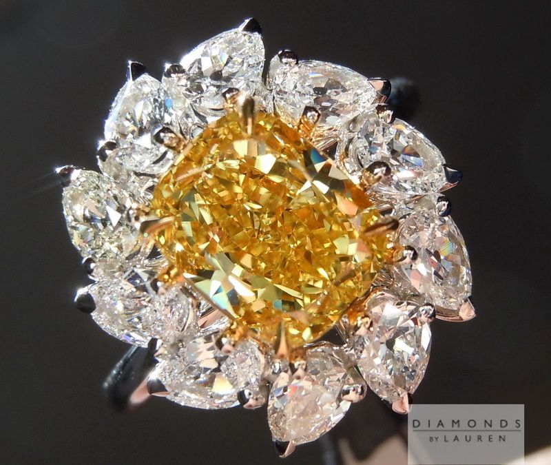 yellow cushion cut diamond ring