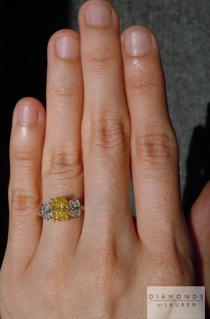 three stone  yellow diamond ring