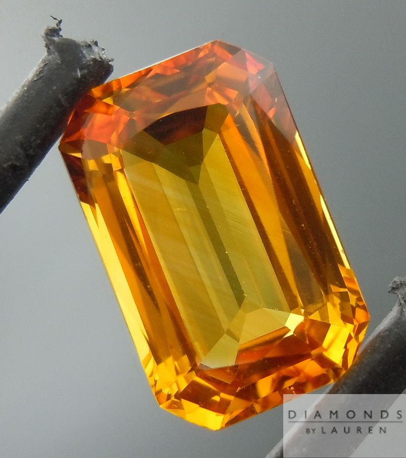 orange emerald cut sapphire