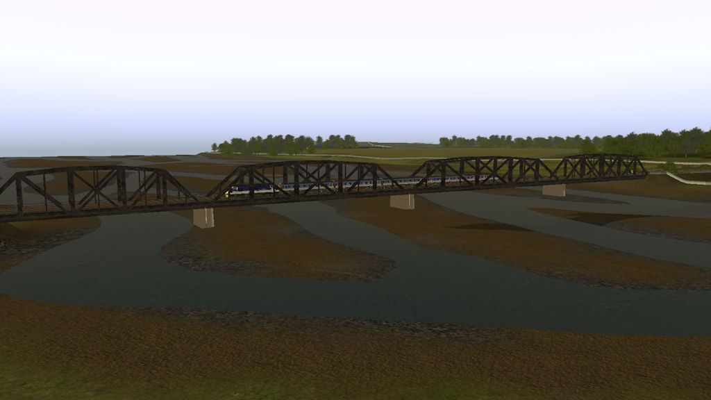 AReggieRailClass37AmblesOverTheRiverArley.jpg
