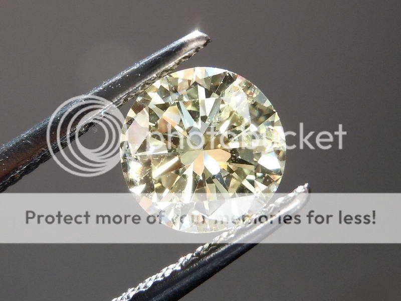 94ct Faint Yellow Round Brilliant I1 Value R4252 Diamonds by Lauren 