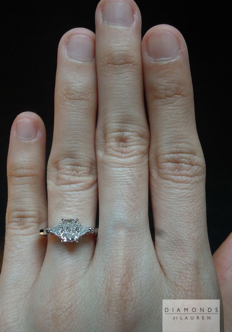 colorless three stone diamond ring