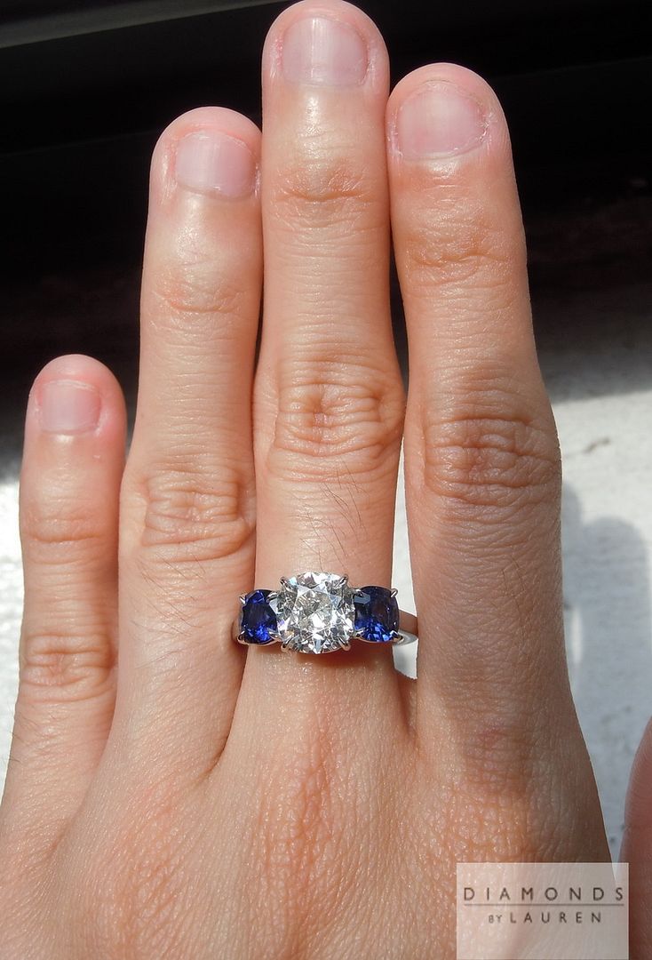 diamond and sapphire three stone ring